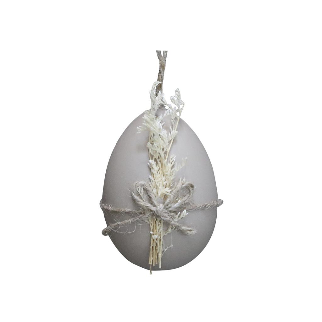 Osterei beige mit getrockneter Blume